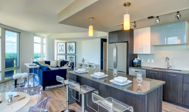 a kitchen with an island and seating