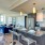 a kitchen with an island and seating