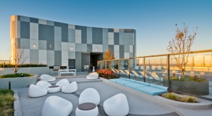Rooftop lounge seating with pool