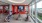 a gym with exercise equipment and tv