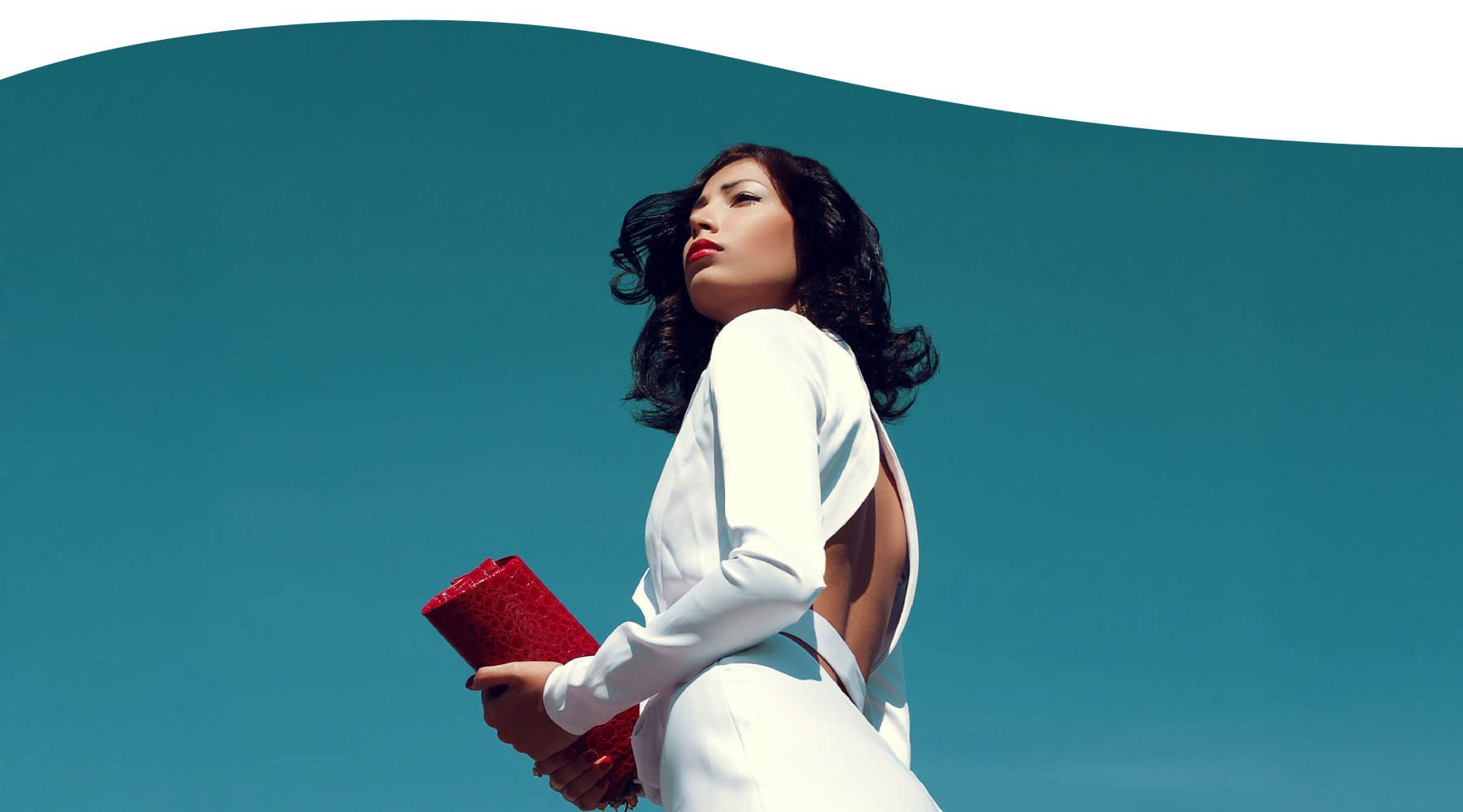 Love where you live a woman standing holding a red book